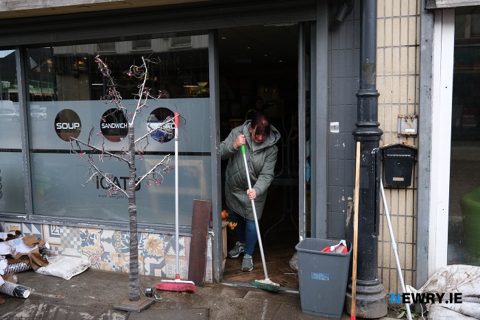 Council Chairperson Valerie Harte helps with the cleanup at Sugar Island. Photograph: Columba O'Hare/ Newry.ie