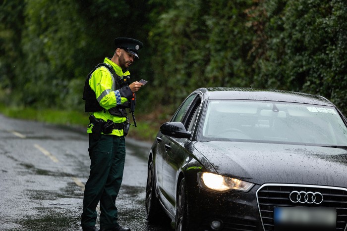 Robin Blair, Neighbourhood Sergeant for South Armagh carries out licence checks at one of the vehicle check points in South Armagh.