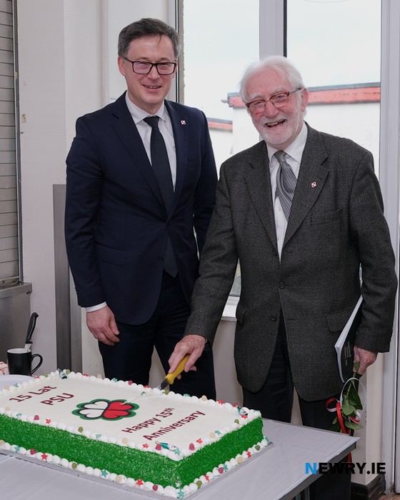 Polish Consul General, Mariusz Stus and Jerome Mullen, Honorary Consul of Poland cut the 15th anniversary cake. Photograph: Columba O'Hare/ Newry.ie
