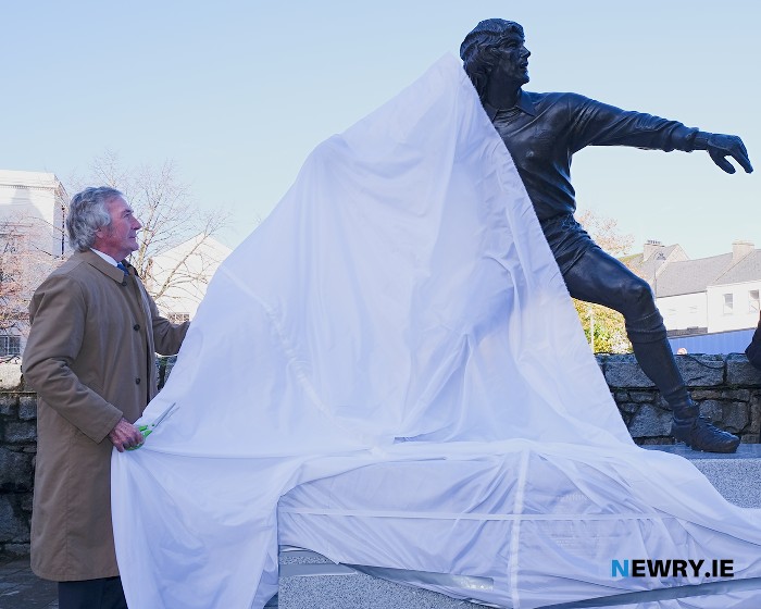 Legendary goalkeeper Pat Jennings unveils a statue in recognition of his Newry roots at Newry Town Hall. Photograph: Columba O'Hare/ Newry.ie