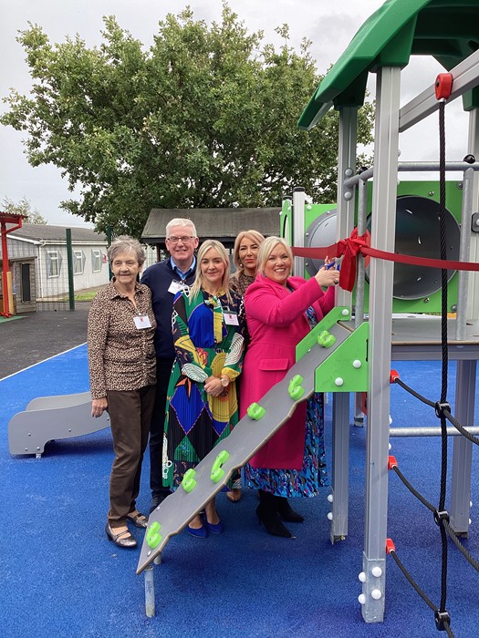 cutting the tape at the new play area at St Malachy's.