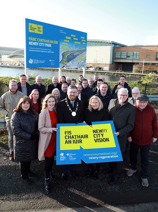 Guests including members of the Newry City Park Stakeholder Group join Council and Department for Communities representatives to celebrate confirmation of £16.2m for Newry City Park and the opening of a temporary community space at the Park site following Department for Communities funding. Front row (from left) Cllr Doire Finn, Co-Chair of the Newry City Centre Regeneration Project Programme Board, Newry, Mourne and Down District Council Deputy Chairperson, Cllr Gareth Sharvin, attending on behalf of Chairperson Cllr Valerie Harte, Newry, Mourne and Down District Council Chief Executive Marie Ward and Department for Communities Permanent Secretary, Colum Boyle.