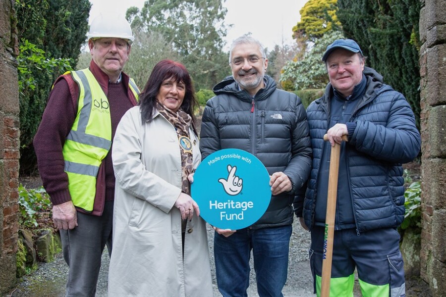 Newry, Mourne and Down District Council Chairperson, Cllr Valerie Harte, announces the appointment of OB Construction to carry out restoration and construction work in Castlewellan Forest Park following funding from The National Lottery Heritage Fund. Pictured from left: Eamon Watson, Manager at OB Construction; Chairperson Cllr Valerie Harte, Mukesh Sharma MBE DL, Trustee and Deputy Chair of The National Lottery Heritage Fund and Chair of the Northern Ireland Committee; and Alwyn Sinnamon, head gardener. 