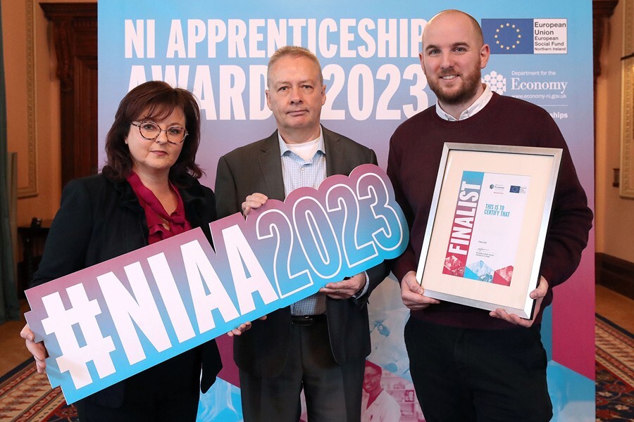 Pictured at the Northern Ireland Apprenticeship Awards 2023 are from left: Dr Lillian Cromie, Norbrook; Mike Brennan, Permanent Secretary at the Department for the Economy and Mark Stewart, Norbrook. 