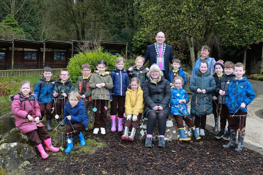 Chairman Newry, Mourne and Down Council, Councillor Michael Savage, Dr. Sally Montgomery OBE National Lottery Heritage Fund and Angela Julian ARG UK with pupils from primary schools attending the final day of Dragons In The Hills Project at Slieve Gullion Forest Park.