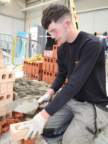 Charlie Hutton (in action) - 3rd place bricklaying
