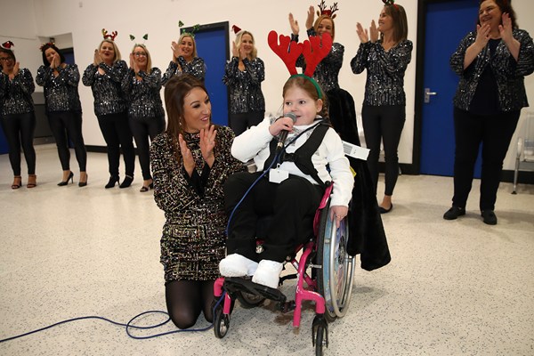 Singing along with the Choir Studio as children headed off on the Northern Ireland Children To Lapland Trust trip. Photographs: Declan Roughan