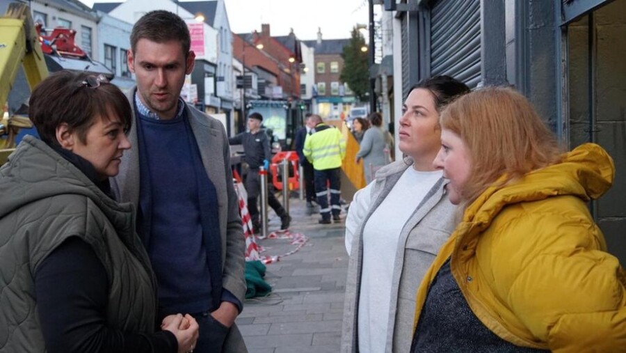 Patrick Brown MLA alongside party leader Naomi Long meeting Downpatrick business owners during the immediate clean up after the flooding.