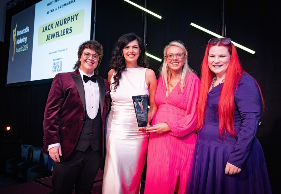 Remarkable Marketing Awards Host Emer Maguire, winners of the Retail & E-Commerce Tara O’Hanlon and Charlotte McAteer with sponsor Tina Calder of Excalibur Press at the Remarkable Marketing Awards at the Europa Hotel in Belfast. Photograph: Brian Morrison