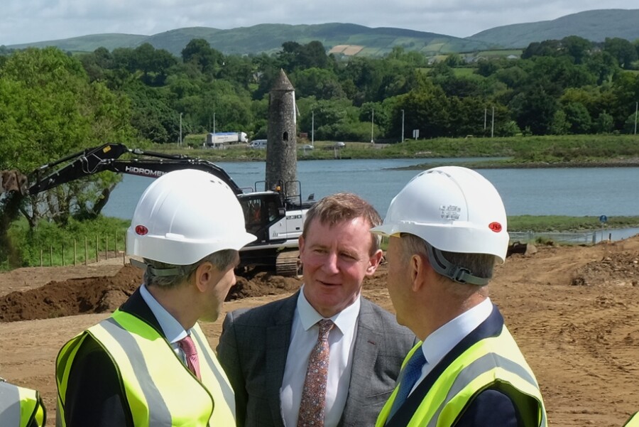 Justin McNulty MLA chats to Taoiseach Simon Harris and Tainiste Micheál Martin on the site of the proposed Narrow Water Bridge. Photograph: Columba O'Hare/ Newry.ie 
