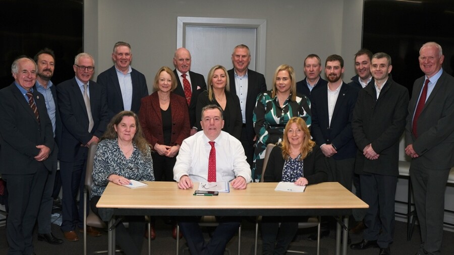 NIFCC CEO Valerie McCann with Chairman George Mullan and Pearl Campbell Finance Manager with attendees at the 2024 Northern Ireland Food Chain Certification AGM in Lisburn. Photograph: Columba O'Hare/ Newry.ie