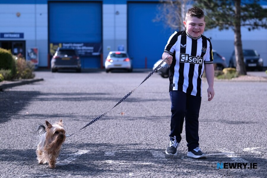 Alfie Pentony and his dog Gizmo finished his 40 mile challenge today at the USPCA in Newry. Photograph: Columba O'Hare/ Newry.ie 