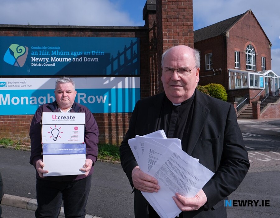 Canon Francis Brown, Administrator, Newry Cathedral Parish and Ronan Mullholland, Newry Cathedral Parish Pastoral Council hand in over 2500 signed letters to the Planning Department of Newry,  Mourne and Down District Council objecting to the proposed planning application for the development of a Civic Hub at the rear of Newry Cathedral. Photograph: Columba O'Hare/ Newry.ie