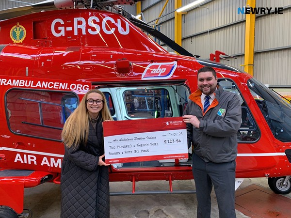 Cllr Alan Lewis Presents Amy Henshaw, AANI With a Cheque. 