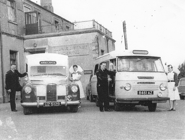 Nurses and ambulance drivers at Mourne District Hospital in Kilkeel, c.1970. Left to right: Wesley Campbell, Nurse McConnell, Nurse Young and Stephen Hardy. Newry and Mourne Museum Collection
