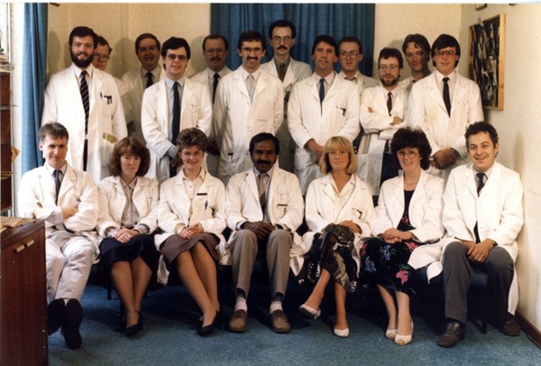 Junior Medical Staff at Daisy Hill Hospital in 1987. Front row (left to right): Dr Fogarty, Dr Maeve Lambe, Dr Anne Dooley, Dr Mohamed Iftikhar, Dr Kerr, Dr Pauline Gaskin, Dr Robert Taylor. Back row (left to right): Dr Niall Doran, Dr Pat Fee, Dr David McAdam, Dr John Magee, Dr Keith Edgar, Dr Michael Scott, Dr Max Watson, Dr Brendan Downey, Dr Michael Fearon, Dr Arnie McDowell, Dr Michael McConville, Dr Henry McLoughlin. Courtesy of Dr Arnie McDowell