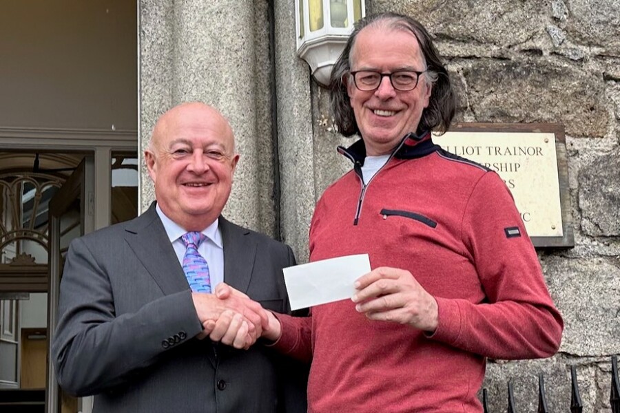 Gerard Trainor, The Elliott-Trainor Partnership pictured donating £500 towards the Newpoint Players All-Ireland campaign chest to Newpoint Chair Donal O'Hanlon.