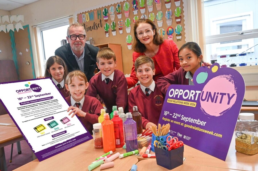 The Community Relations Council, together with the Education Authority, is inviting primary and secondary school students across the region to get involved in this year's Poster Design Competition for Good Relations Week 2024.   Pictured Peter Day, Director of Engagement at Community Relations Council, Frances Hughes, Principal of Rowandale Integrated Primary School, Lena Becerra, Grace McGarry, Elijah Glendinning, Callan McTaggart and Alexandrea Quibael.  