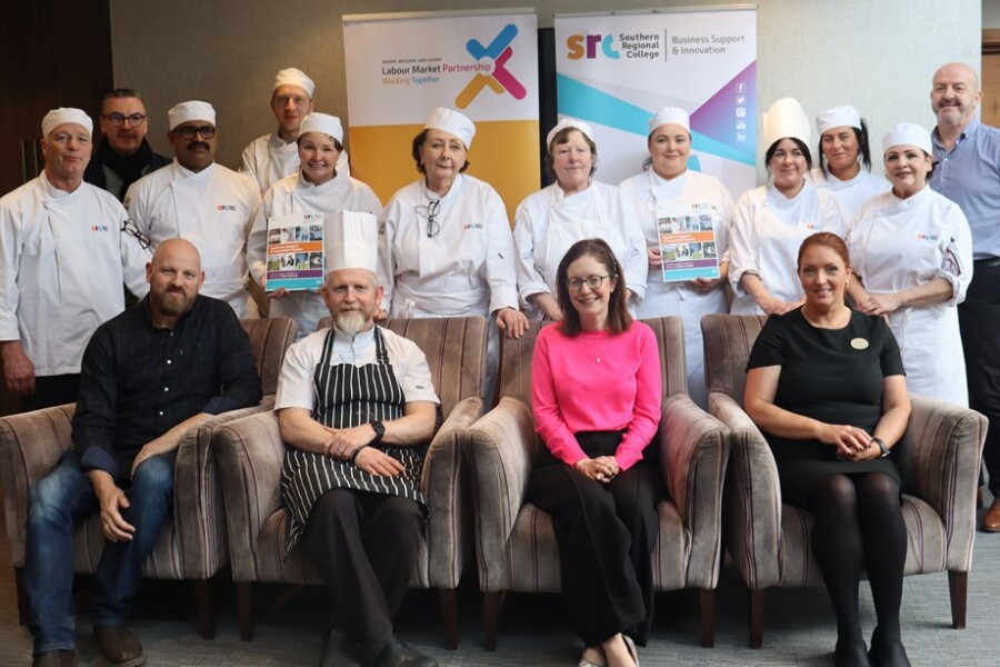 Participants of Chef Bootcamp alongside officials from NMDDC, Jobs & Benefits office & SRC. Included back from left: Damien McCorry (Jobs & Benefits Office Newry); Alan Smart (Banbridge); Niamh McNally (Warrenpoint); Raymond Sloan (Director of Client Services, SRC). MiddleL John Rooney (Annalong); Richard Xavier (Newry); Teresa Armstrong (Newry); Nuala Gorman (Warrenpoint); Rosemaria Rooney (Rostrevor); Louise Dick (Newtownhamilton); Louise McKevitt (Newry); Carol Hamilton (Banbridge). Front: Jeff Smyth (Business Development Executive, SRC); Dean Coppard (SRC Food Innovation Specialist); Kytrina Mullen (Skills and Employability Office, Newry, Mourne and Down District Council); Annette Grant (Kitchen Manager, Whistledown Hotel).