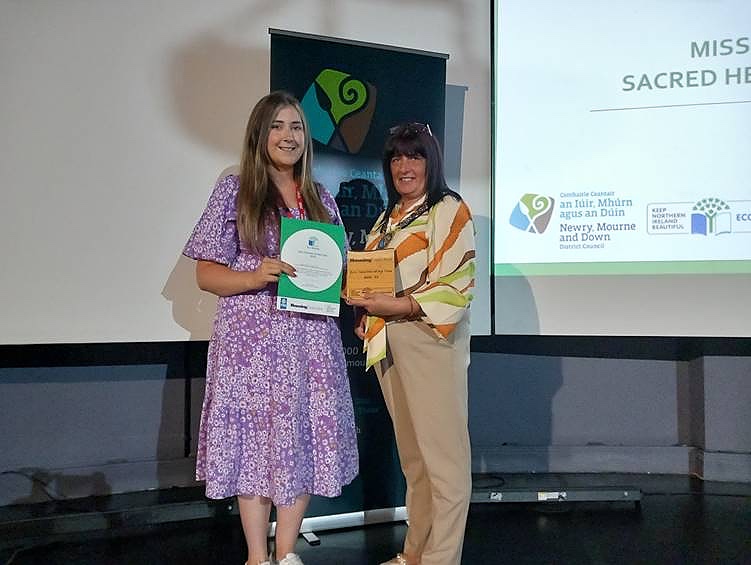 Newry, Mourne and Down District Council Chairperson, Councillor Valerie Harte with the Council’s Eco-Teacher of the Year – Miss Nadine Crozier, Sacred Heart PS, Dundrum