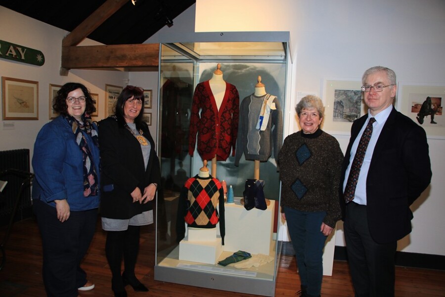 Newry, Mourne and Down District Council Chairperson, Councillor Valerie Harte pictured with, from left: Joanne Cummins Collection Officer at Newry and Mourne Museum, Dr Ken Abraham, Curator of Newry and Mourne Museum with Esther Bloch at the new exhibition of artefacts on display from Kilkeel Knitting Mills which was set up by Esther's parents, Edith and Kurt Sekules in 1950. The factory was subsequently managed by Esther's brother, Walter, until it closed in 2022.