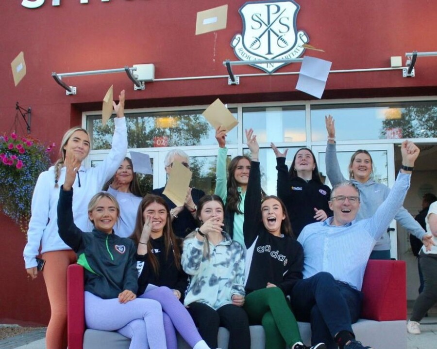 St Paul's High School Pupils celebrating their results with Principal Mr Jarlath Burns.