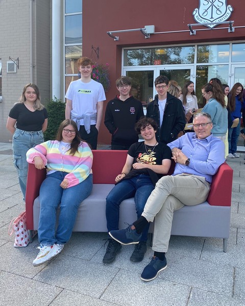 St Paul's Principal Jarlath Burns pictured with some of the schools high achievers.