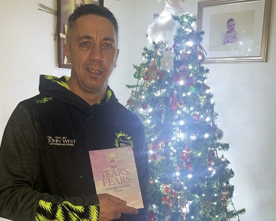 Declan Moan with his new book.