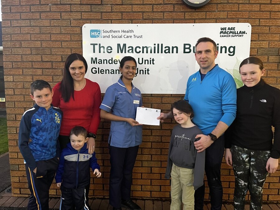 Edel McMahon and Francie McMullen with their children Donncha, Fiachra, Saorfhlaith, Caitlín  and staff nurse Ann-Maria Thomas.