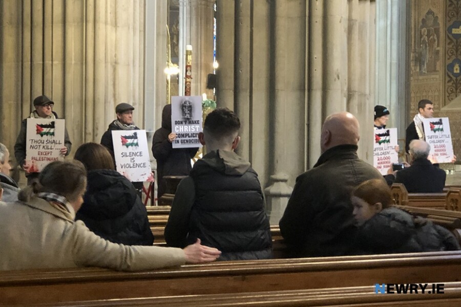 Protestors from Christians4Gaza in St Patrick's Cathedral, Armagh.