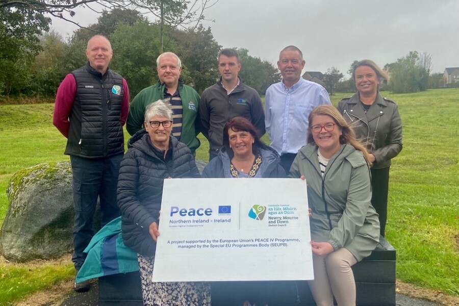 Councillor Valerie Harte launches the community open space at the ex-military Forkhill barracks site and is photographed alongside back from let: Seamus Crossey, Newry, Mourne and Down District Council; Gerard McKeever, NMDDC; Sean Lennon, T&S Utilities Contractors; Cllr Mickey Larkin, Slieve Gullion Cllr and Justina McCabe, NMDDC Programmes Unit. Front: Philomena Trainor, Forkhill Community Association and Elaine Carr, NMDDC PEACE Programmes Unit.