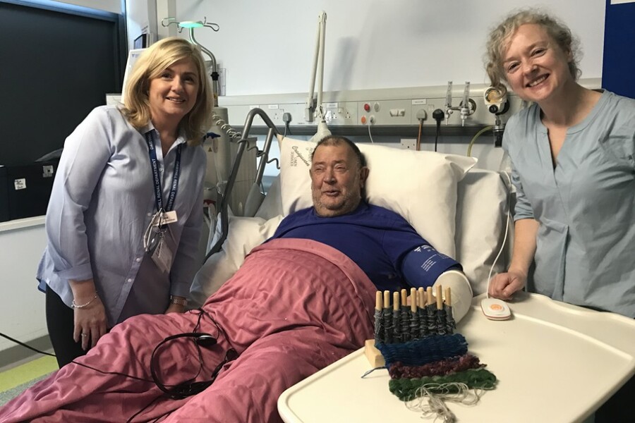 Lead nurse for Nephrology, Fiona Owens and Arts Care, artist in residence Caroline Shimmons with patient Ronnie.