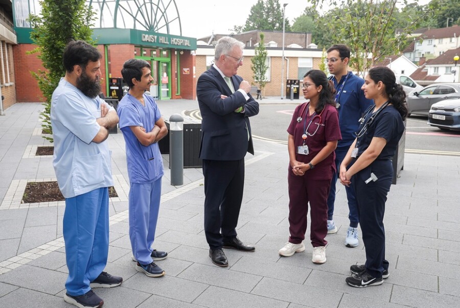 Health Minister Mike Nesbitt with internationally recruited doctors (from left): Urology Consultant Dr Sartaj Wali Khan; Radiology Consultant Dr Harsh Ketan Shah; Dr Ankita Dash, General Medicine; Dr Shivam Dutt, General Medicine, and Dr Kasthuri R Pillai, General Medicine.