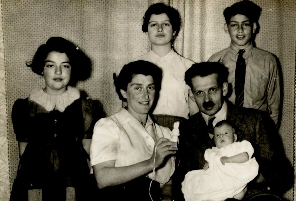 Edith and Kurt Sekules pictured with their children, Leah, Ruth, Walter and Esther (on her father’s knee) in Kilkeel in 1954. Courtesy of Walter Sekules