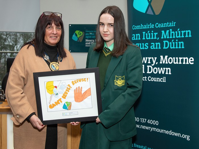 Newry, Mourne and Down District Council Chairperson Councillor Valerie Harte is pictured with Jane Keenan, Sacred Heart Grammar School, Newry with her entry for the Schools’ Environmental Poster Competition in Downpatrick at this year’s prizegiving event.