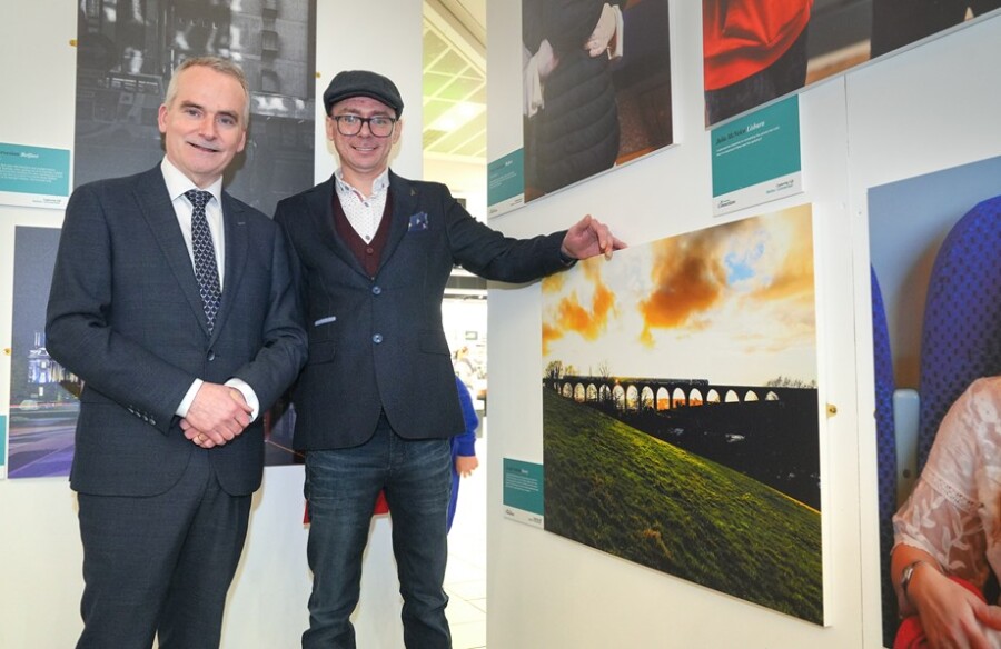 Pictured at the Translink Connections Exhibition are Translink CEO Chris Conway and photographer Joseph Lennon with his photograph of the 18 Arches.