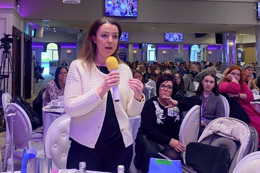 Liz Kimmins, MLA speaking at the Women's Aid conference.