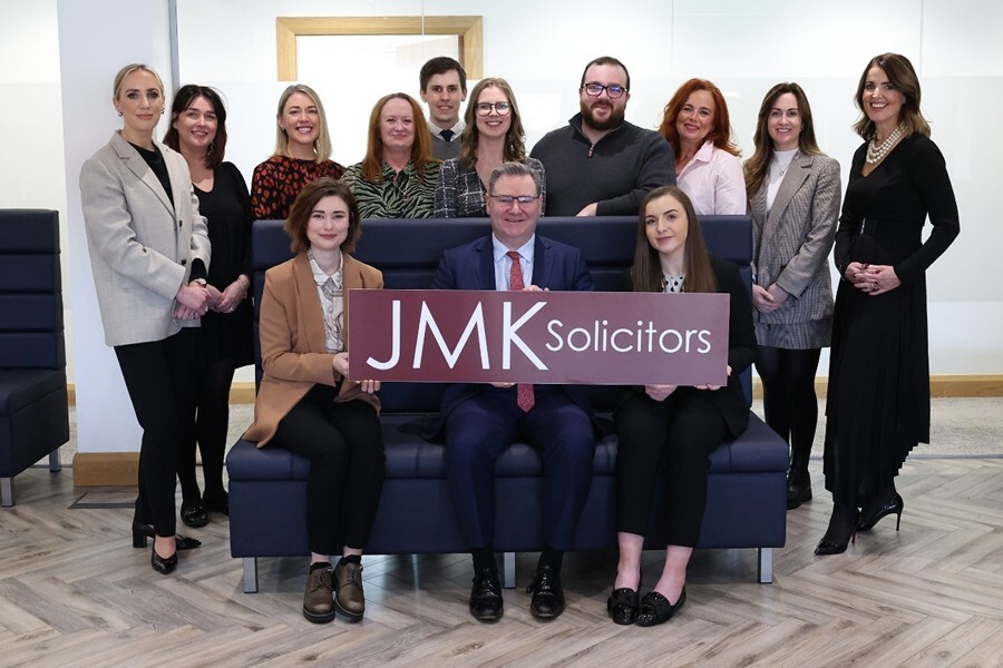 New staff at JMK Solicitors and Chairman, Jonathan McKeown, Managing Director, Maurece Hutchinson pictured with Legal Services Director, Olivia Meehan.