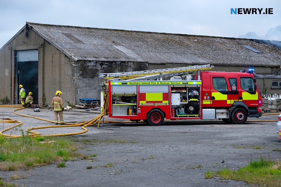 The council store on the Albert Basin which is due to be demolished. Photograph shows a fire at the site in 2021. Photograph: Columba O'Hare/ Newry.ie 