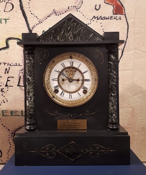 Slate and marble clocks were a popular type of mantle clock in the late 19th and early 20th centuries. They became a favourite presentation piece to mark significant anniversaries or retirement from employment. Newry and Mourne Museum Collection