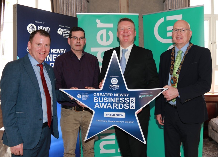 Getting ready for the Greater Newry Business Awards are from left: Tony McKeown, CEO, NEwry Chamber of Commerce and Trade; Columba O'Hare, Newry.ie; Peter McMonagle, nijobfinder and Cllr Michael Savage, Chairperson, Newry, Mourne and Down District Council.  Photograph: Liz Boyle