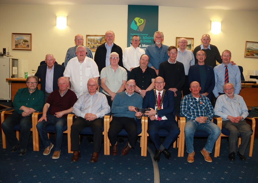 Members of the 1972 Carnbane Rovers Team pictured with Council Chairperson Cllr Michael Savage.