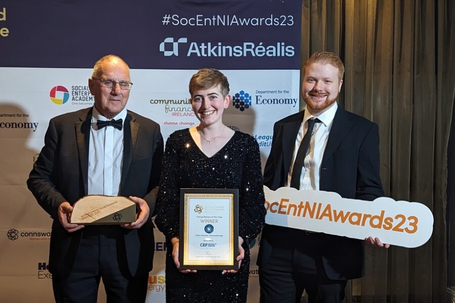 Claire Mooney (middle) at the Northern Ireland Social Enterprise Awards alongside Moneydarragh Hub members Hugh Cox (left) and Ruairí Jordan (right)