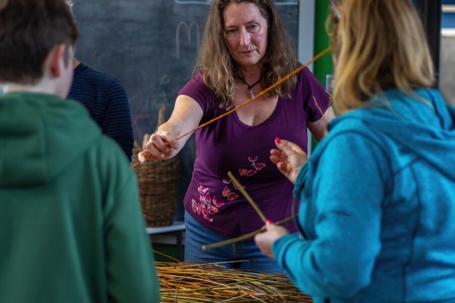 Heather McDermott leading a natural crafts workshop at Moneydarragh Hub.