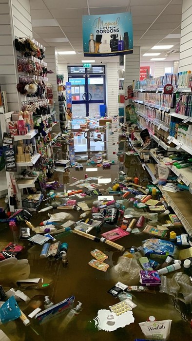 The horrific scene that greeted shop staff after the flooding.
