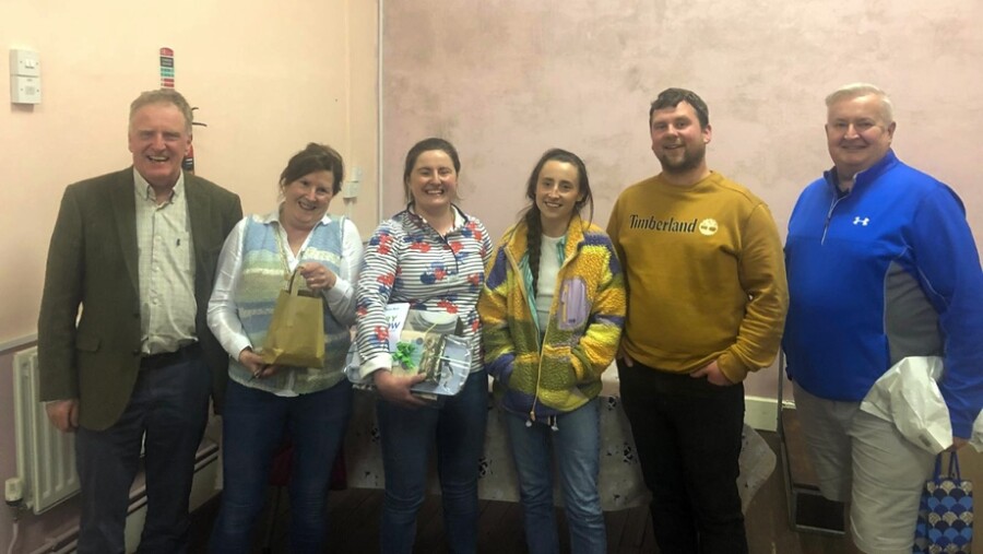 Quiz master Colin Moffett (right) congratulates members of the Bell family, who were one of the winners at the recent Newry Show Annual Quiz, held in Jerrettspass