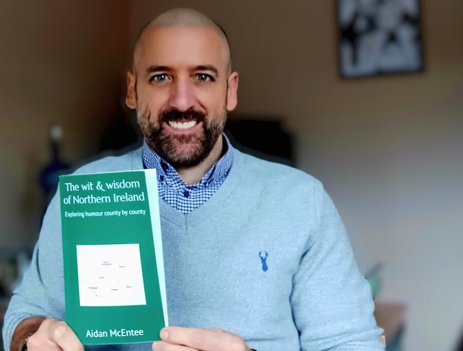 Aidan McEntee with his new book The Wit and Wisdom of Northern Ireland: Exploring Humor County by County.
