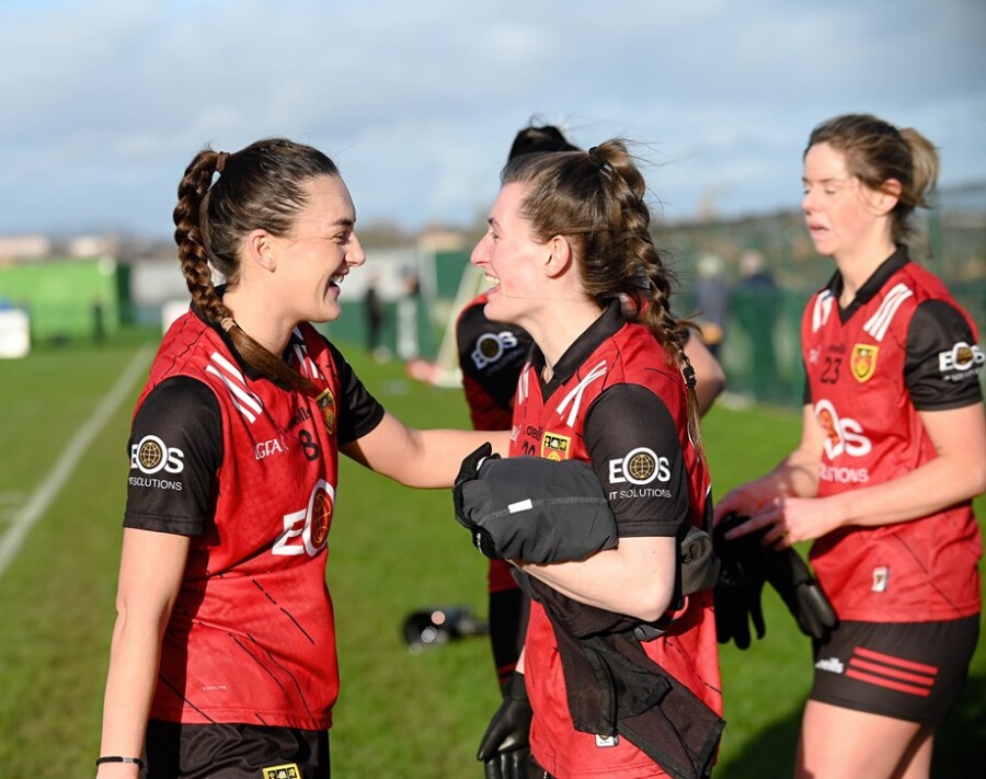 Down players Clara Mulvenna and Sarah Dougherty enjoy a moment at the final whistle of Sunday's National League clash between Antrim and Down at Davitt Park Belfast Photograph: Brendan Monaghan