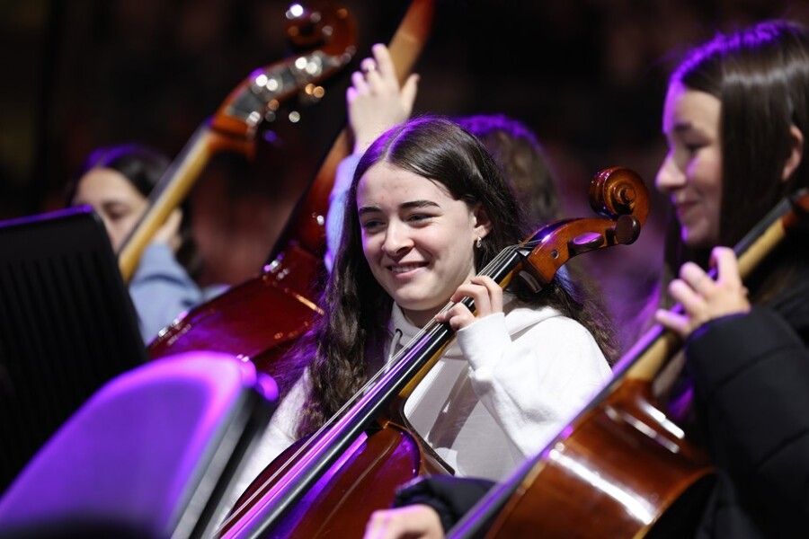A member of the Cross Border Orchestra of Ireland rehearsing for the Belfast Peace proms concert 2024.