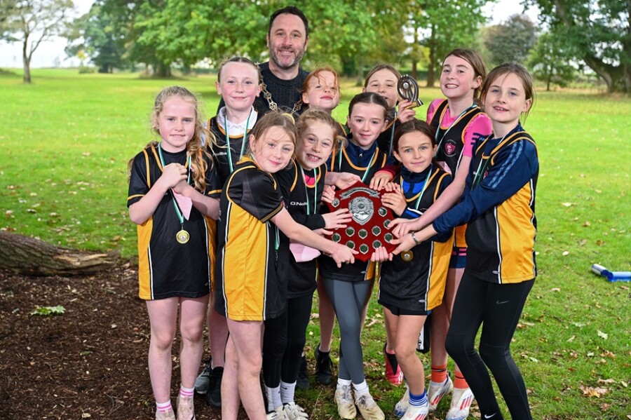 Newry, Mourne and Down District Council Chairperson, Cllr Pete Byrne pictured with, St Patrick’s Primary School, Crossmaglen Girls’ team who proudly took first place.